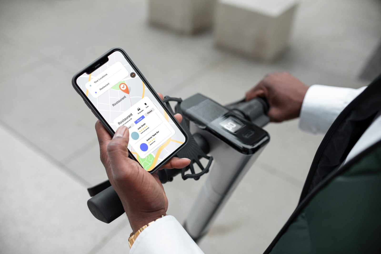 a young man using his mobile phone to track a delivery